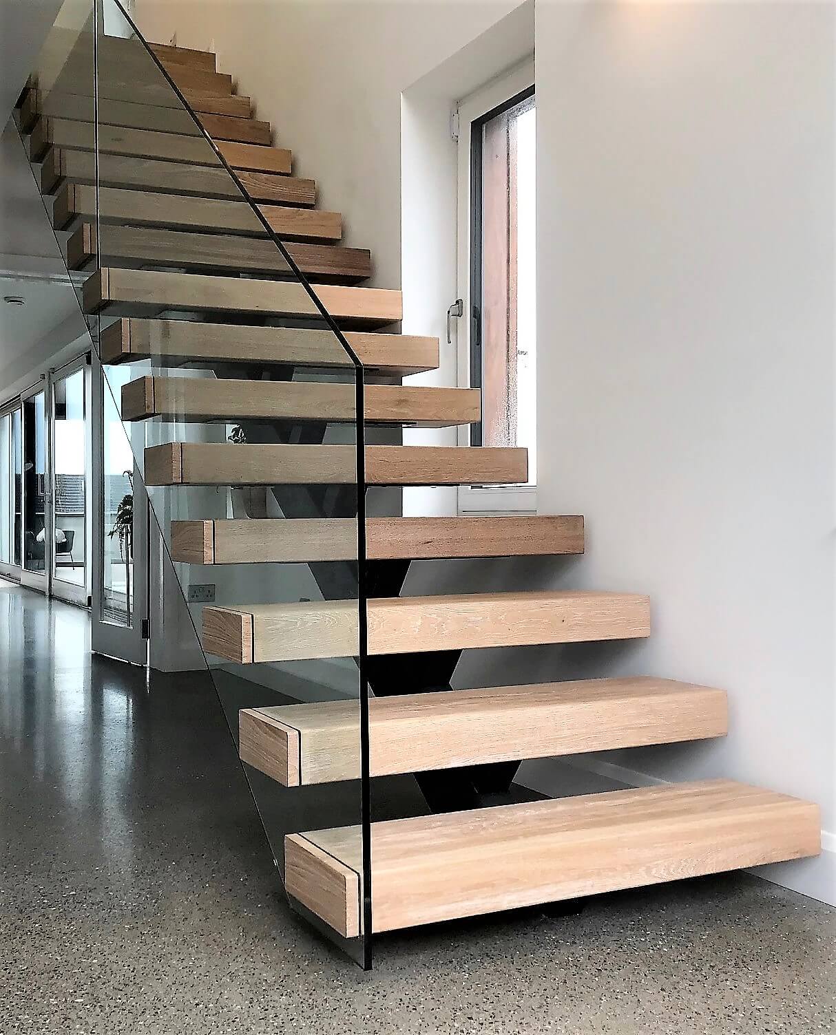 Anthracite grey steel spine stairs Staircases Design Stairs